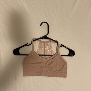 It's a light pink sport bra size small